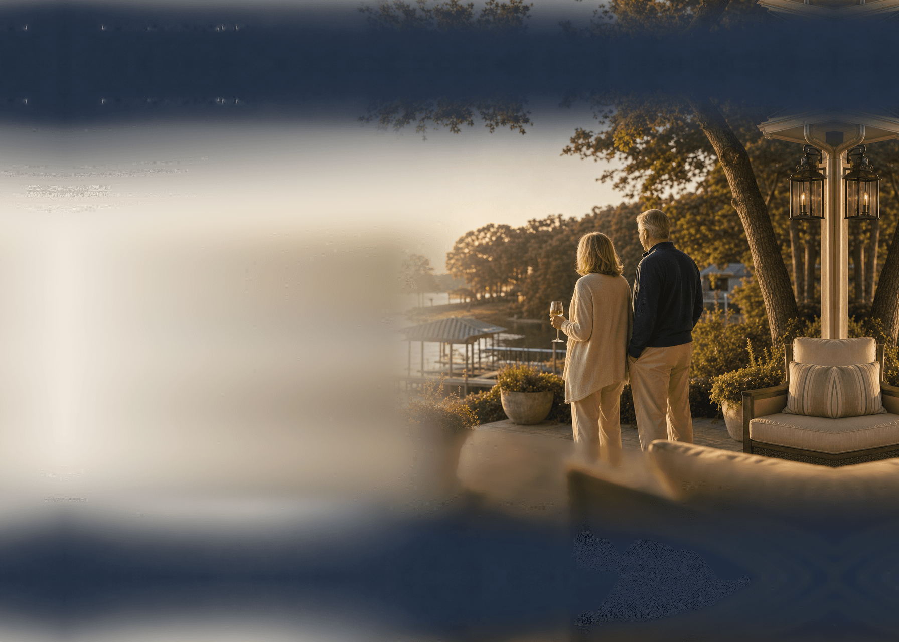 A couple watching the water from their terrace in unhurried afternoon light