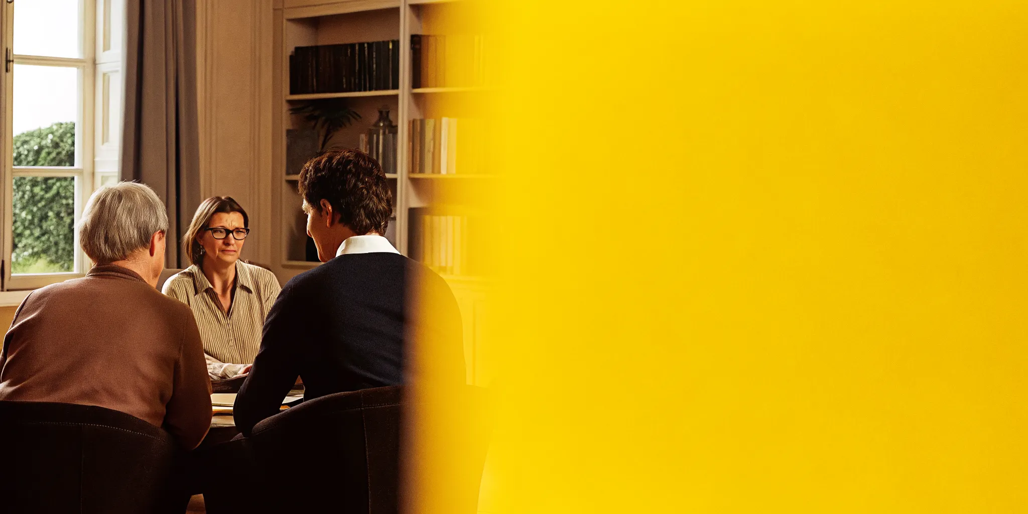 Family discussing inherited IRA rules with a wealth professional