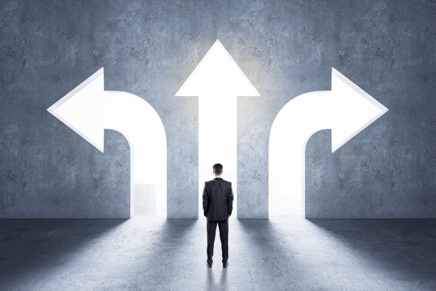 Choice,Concept,With,Businessman,In,Front,Of,Arrow,Holes,Directed
